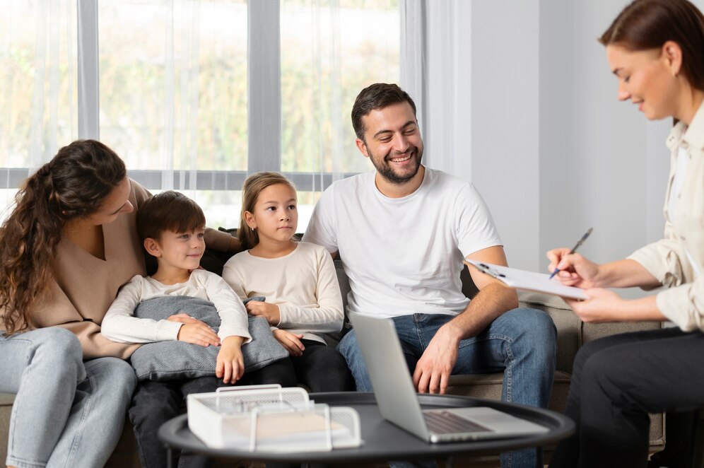close-up-family-talking-therapist