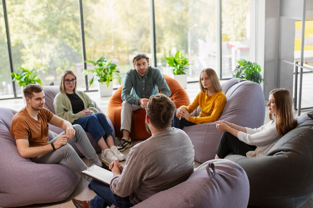 people-attending-therapy-meeting_23-2151083315
